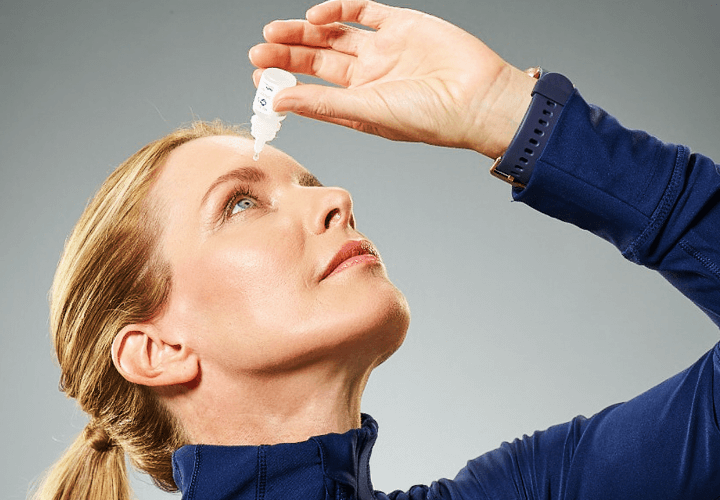 Woman putting Vuity (pilocarpine HCI ophthalmic solution) in Eyes